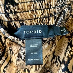Torrid EUC Size 6 Snakeskin Design Pants.